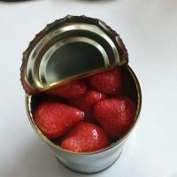 Canned Strawberry Fruits In Light Syrup In Glass Jar